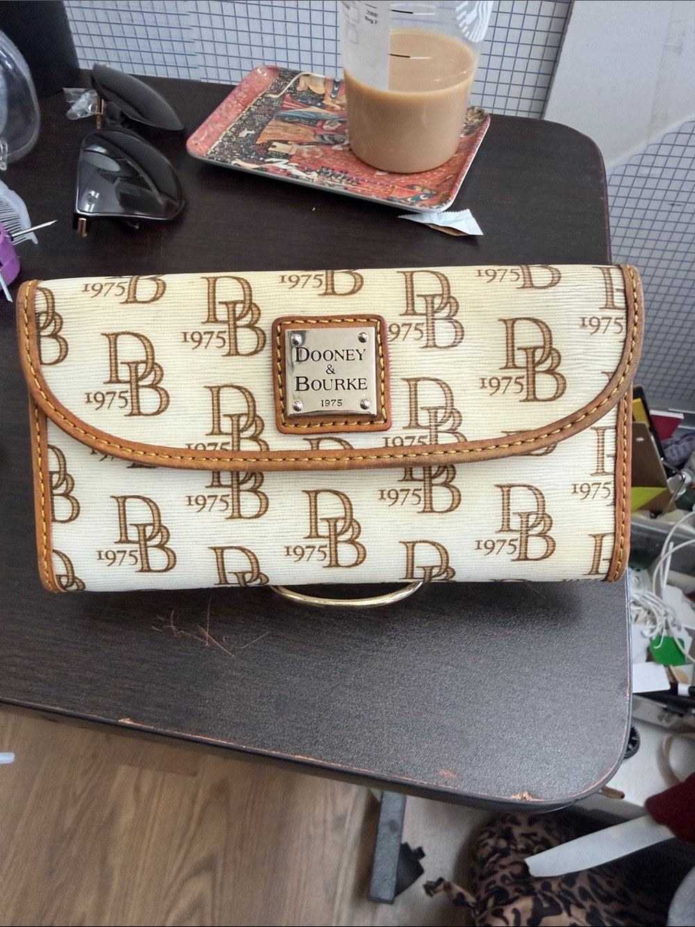 Dooney & Bourke Cream and Brown Logo three fold wallet